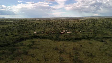 aerial view of a tented safari camp located inside the serengeti national park in tanzania during a sunny day