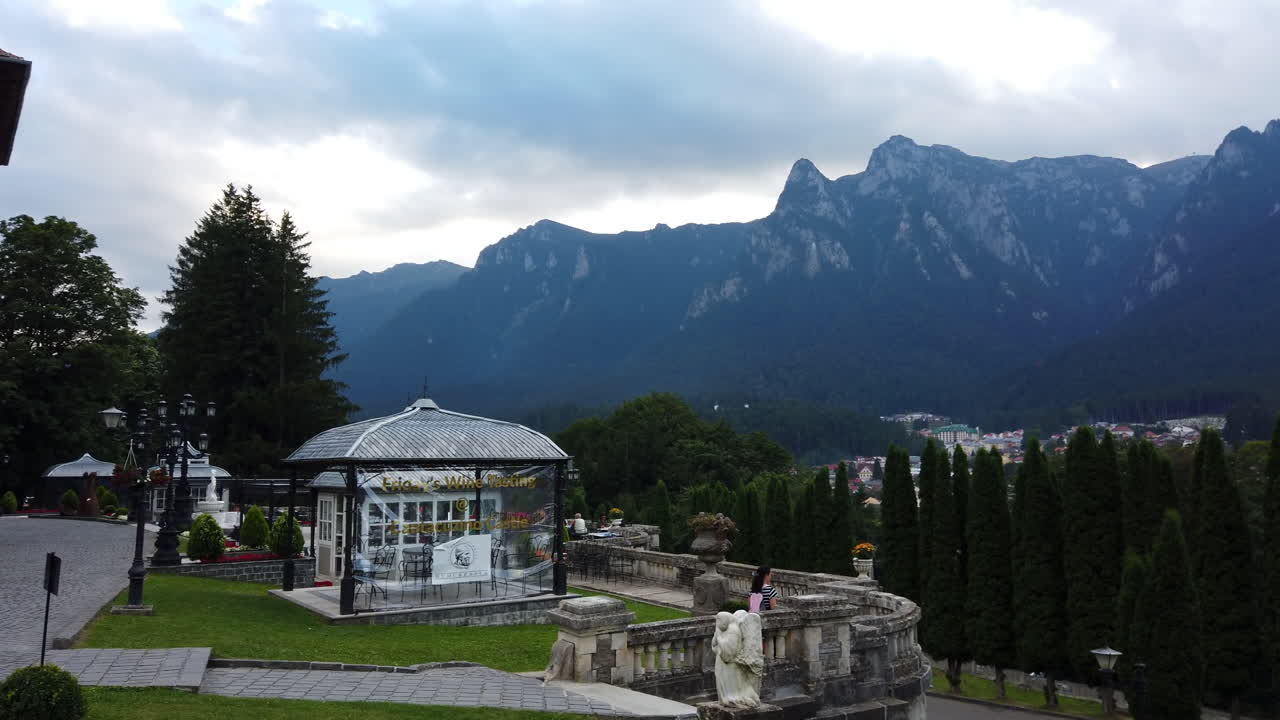 The facade and the courtyard of the Cantacuzino Castle in Busteni, Romania