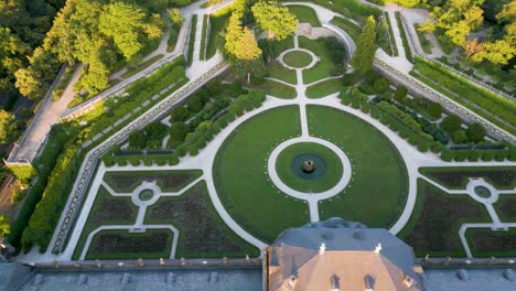 4k aerial drone video of the felsenbrunnen garden at the residence palace in würzburg, germany