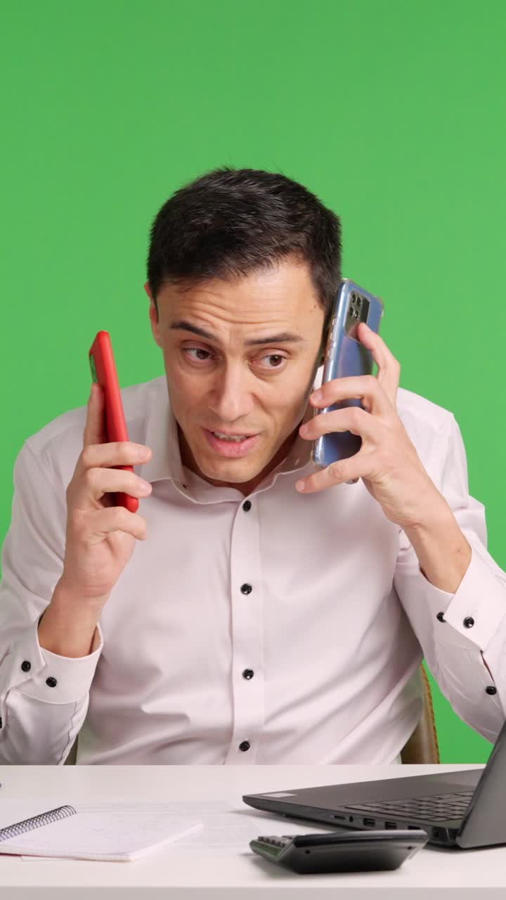 Office worker overwhelmed by workload on green screen