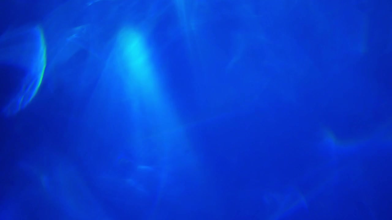 Fughe di luce blu astratte e bagliori ottici
