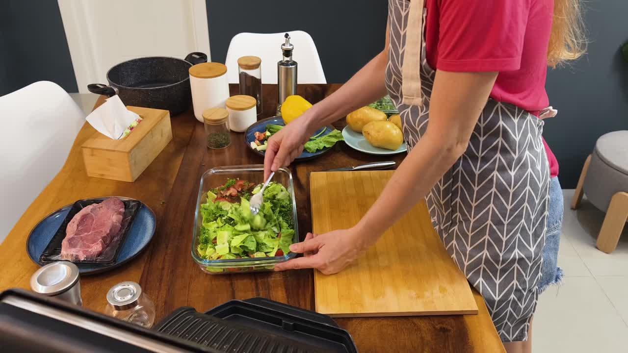 Preparing a Salad with Fresh Ingredients