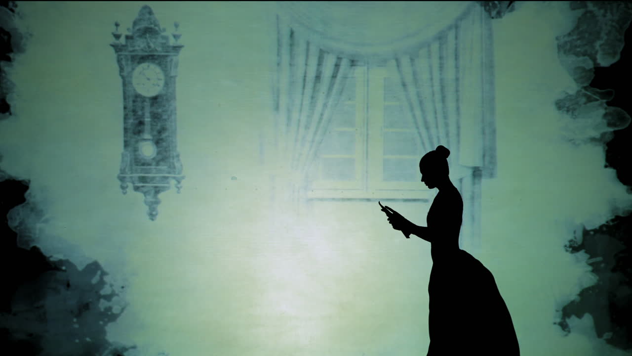 Silhouette of a Woman Reading a Book