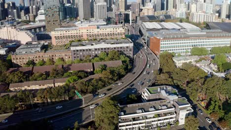 aerial view of city with modern skyscrapers and city road in sydney cbd, australia - drone shot