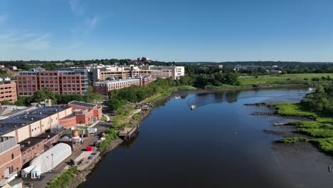 an aerial view over the norwalk river on a sunny day