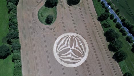 mysterious warminster crop circle aerial view above geometric pattern carved into rural countryside farmland