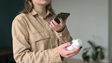 blind woman using mobile app to read product label at home 2