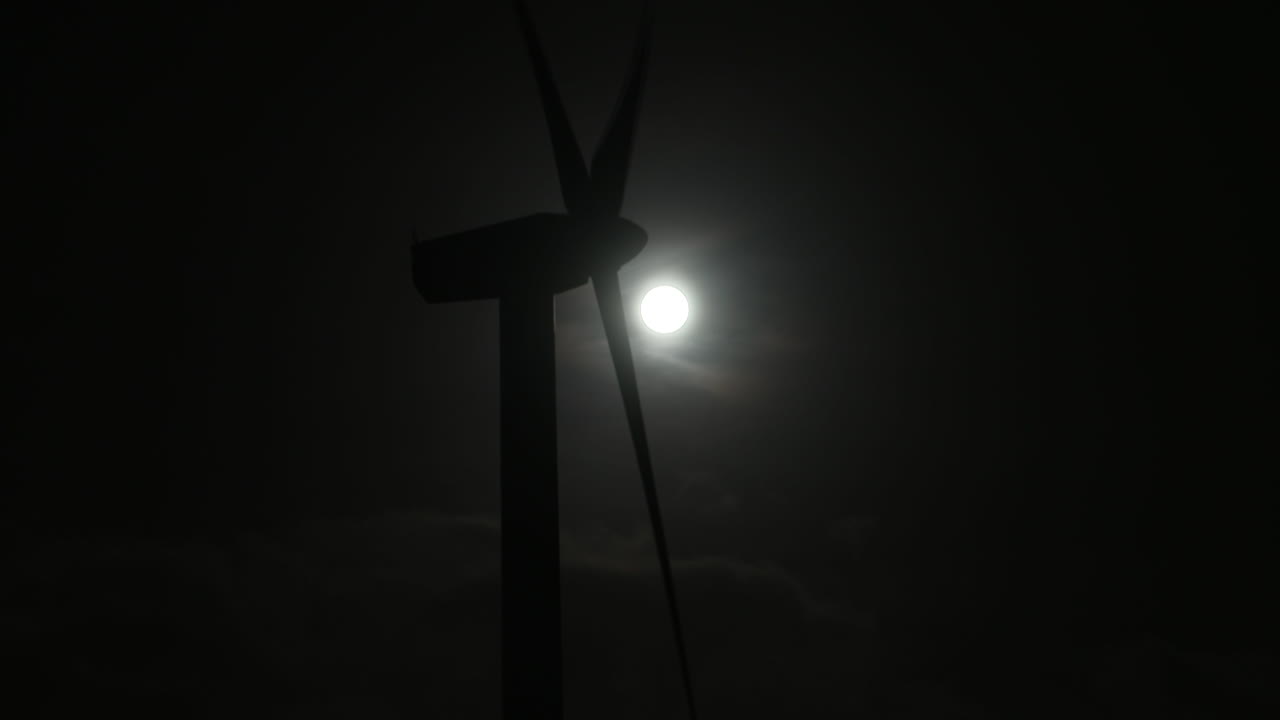 Renewable energy - Wind power - Clean electricity - Green energy - Wind turbines
This nighttime footage captures a giant wind turbine in action, generating electricity using the power of the wind.