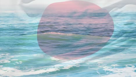 animation of flag of japan blowing over beach seascape