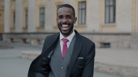 happy businessman in a suit