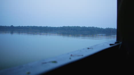 calming twilight boat view across kabini river gently rippling in nagarhole national park