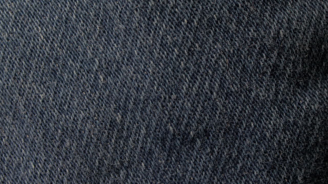 un macro de patrón de textura de jeans azules, filmado en 4k 60p 10bit, prores422, con grabador externo de átomos