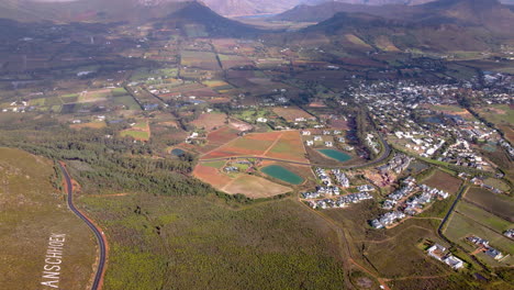 Franschhoek-pass-overlooking-scenic-town-in-fertile-wine-valley