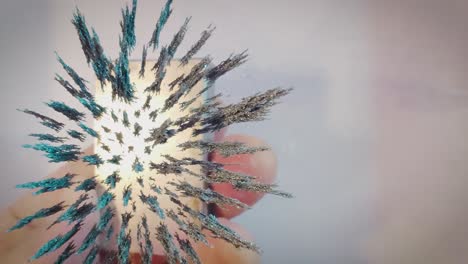 iron filings moving in the magnetic field of a neodymium magnet, overhead shot