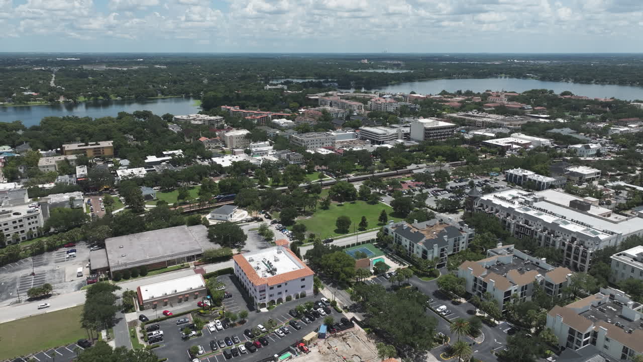 Aerial View Of Winter Park Municipality Buildings With Lake In The Distance In Orlando, Florida, USA