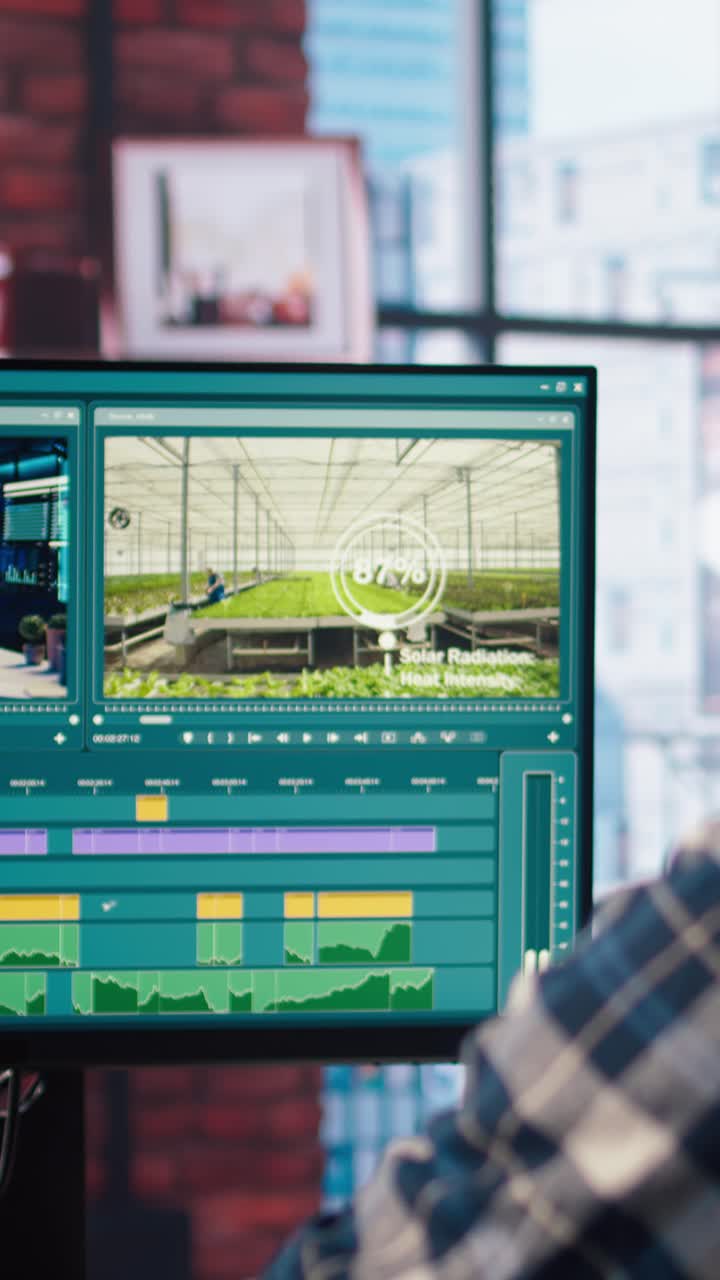 Vertical video Video editor wearing headphones to polish raw footage and improve audio quality