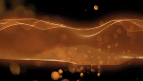 animation of orange smoke and dots on black background