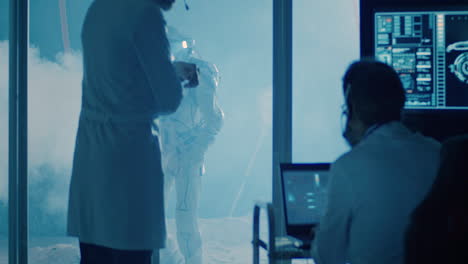 astronaut preparation in a research facility