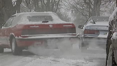 1995-CAR-PULLS-OUT-INTO-SNOWY-WEATHER