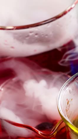 vibrant liquids reacting with smoke and tools