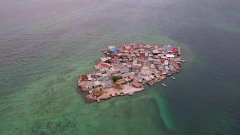 drone flying towards santa cruz del islote island in colombian caribbean