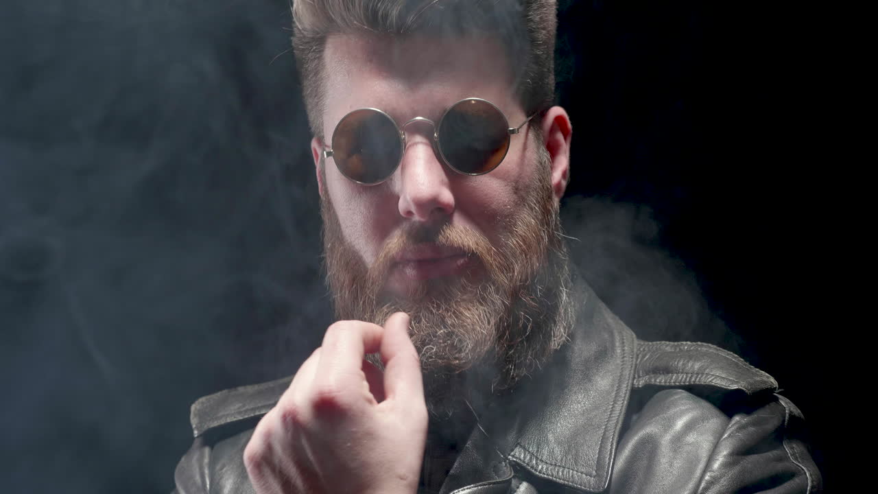 Man Vaping with Sunglasses