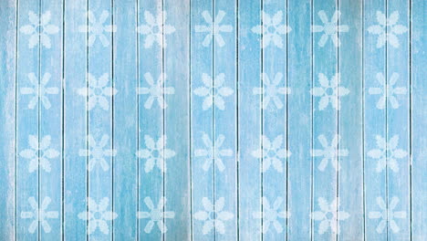 animation of snowflakes christmas pattern on blue background