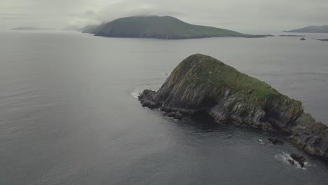 Beautiful-Aerial-View-of-Jagged-Rock-Formations-Stretching-out-to-Sea-from-Dunmore-Head-in-Ireland-Along-the-Wild-Atlantic-Way