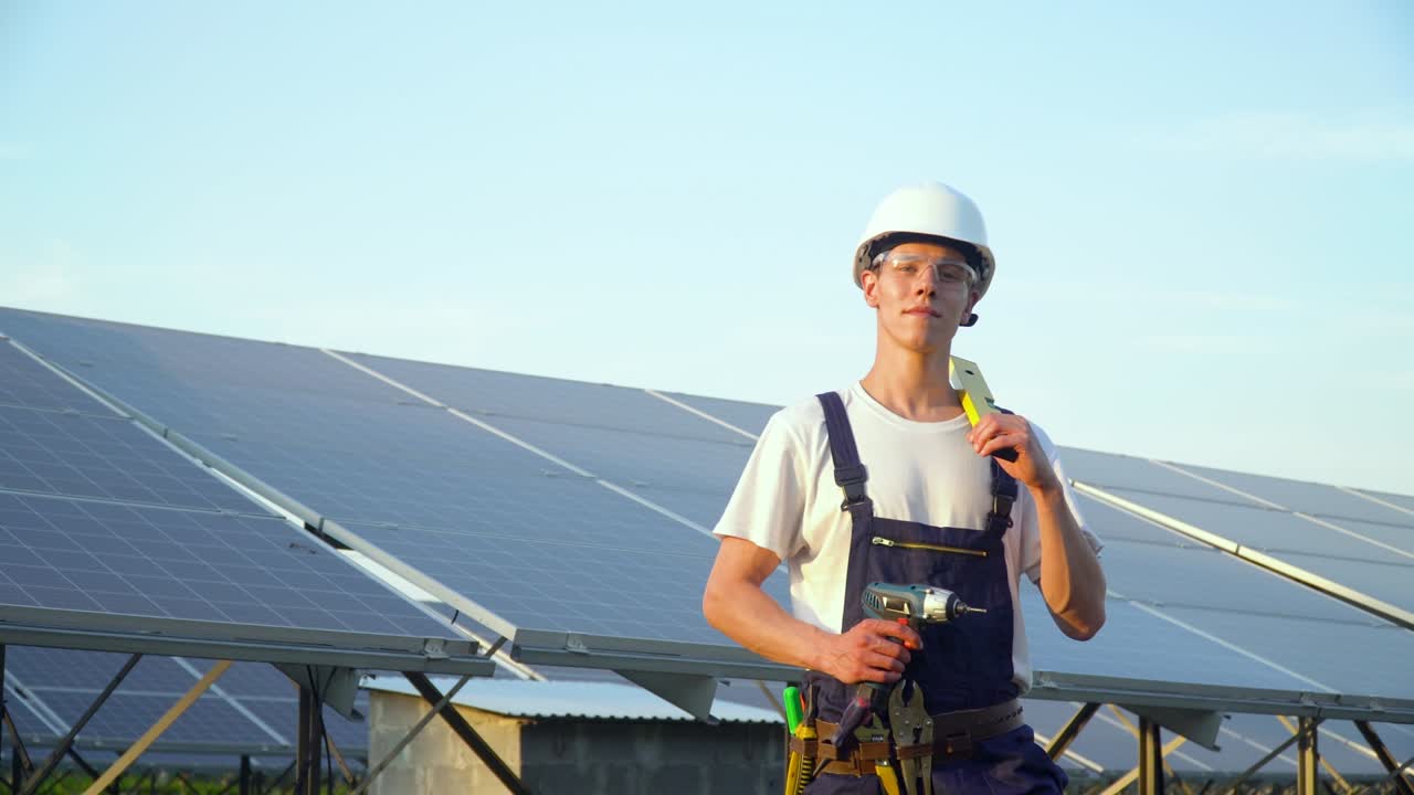 Solar panel technician working with solar panels