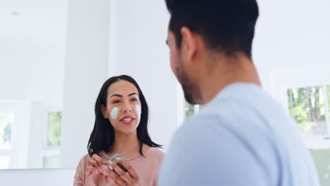 Skincare,-cream-on-face-and-couple-in-bathroom