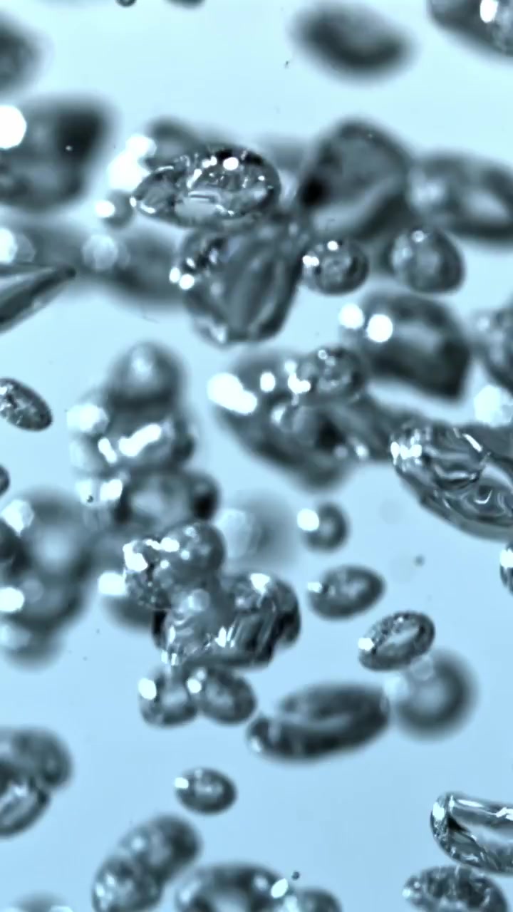 Clear Air Bubbles Rising in Blue Water