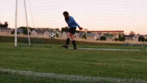 female keeper waiting for female soccer player to kick the ball. 4k