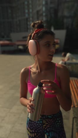 young woman exercising outdoors