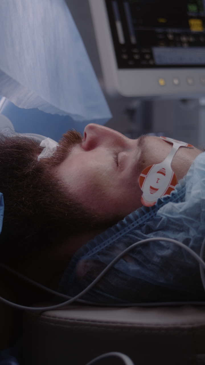 Close up of patient lying on surgical table 4k 2025 08 04 04 57 16 utc.mov | adult, anesthesia, assistance, bedside