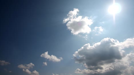 white clouds over blue sky - timelapse