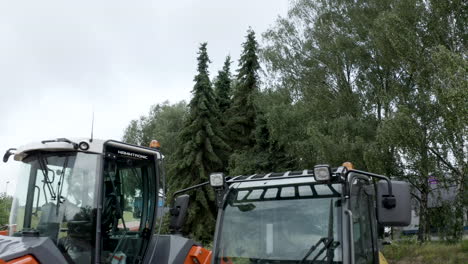 Modern-red-tractor-seeding-directly-into-the-stubble-with-red-equipment-using-GPS-for-precision-farming