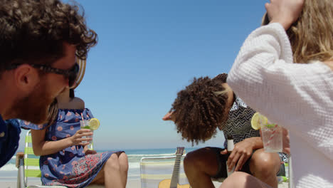 group of friends having fun at beach 4k