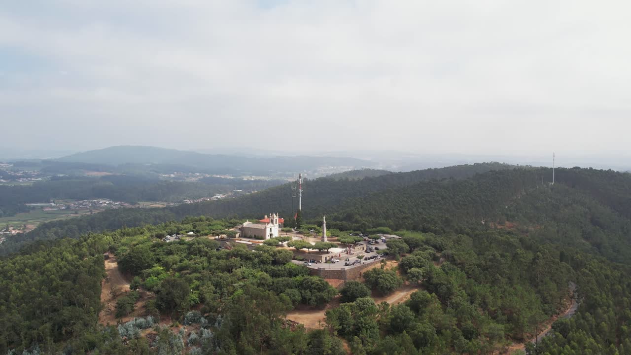 Drone forward toward Sanctuary of Nossa Senhora da Franqueira on Monte da Franqueira hill in Barcelos, northern Portugal