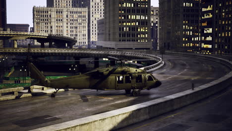 helicopter on an urban highway during nighttime in a bustling city