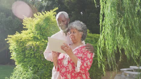 A-senior-African-American-couple-spending-time-together-in-the-garden