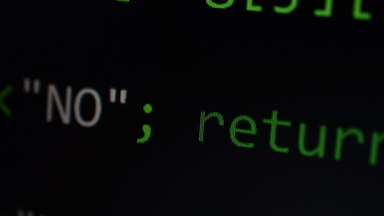 Source code on the monitor screen. Source code