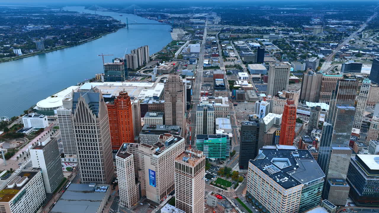 Detroit, USA, 28 July 2025: Footage over the city along the river waterscape. Drone flight over the high-rises of Detroit, Michigan, USA