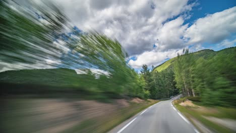 a drive on a narrow road in the norwegian countryside