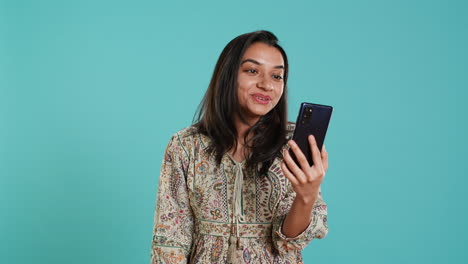 Smiling-woman-having-friendly-conversation-on-videocall