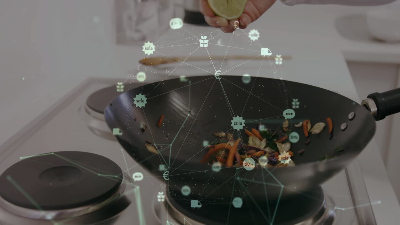 Woman in food tech gripping wok squeezing lime juicing veggies as digital icons shifting above wok