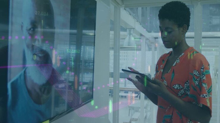 Animation of data processing over african american business people working in office