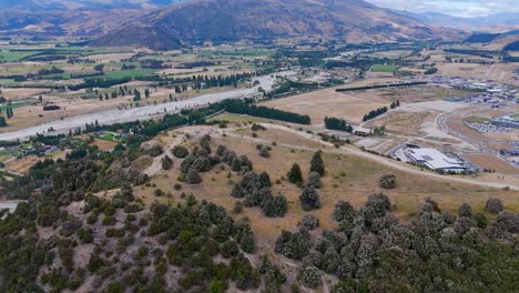 Aerial-view-of-Mt-Iron-track-and-peak-during-daytime-in-New-Zealand