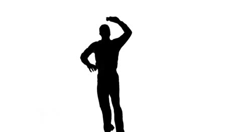 silhouette of a jumping man turning on white background