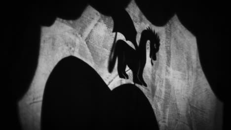 shadow puppets of a dragon and a witch