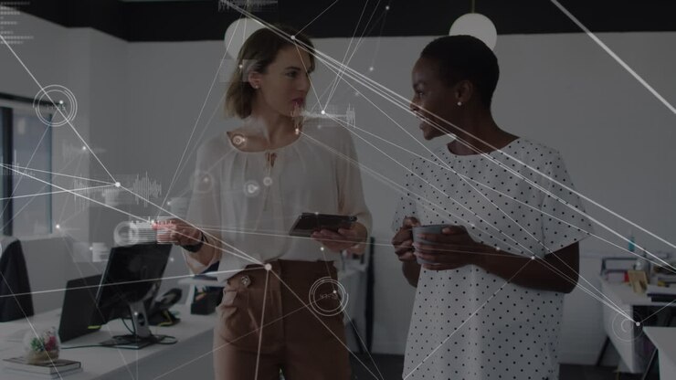 Animation of network of connections over diverse business people in office